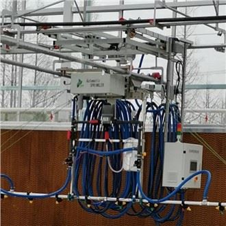 Barras de riego automático con vehículo de transferencia